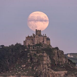 The Full Moon behind St. Michael's Mount.