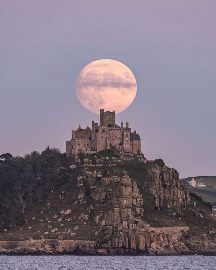 The Full Moon behind St. Michael's Mount.