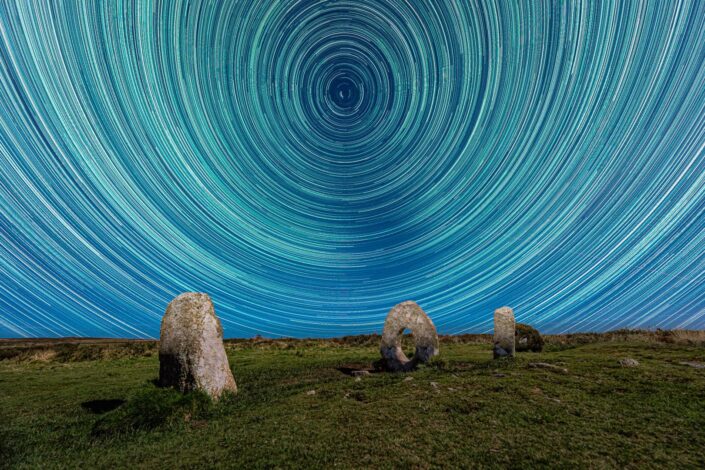 Star trails created from 6 hours of camera exposure at Men an Tol, Penzance, Cornwall.