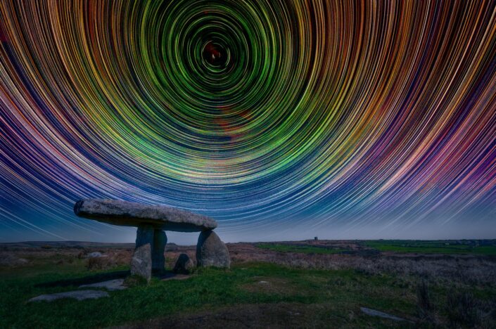 Psychedleic star trails over Lanyon Quoit Ancient Monument, Penzance, Cornwall